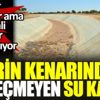 Nehrin kenarında su geçmeyen su kanalı Nehrin kenarında su geçmeyen su kanalı