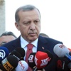 Erdoğan, şehit ailelerine başsağlığı diledi Erdoğan, şehit ailelerine başsağlığı diledi