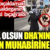 ﻿ DHA muhabiri karısını bıçaklamak isteyen saldırganın belindeki bıçağı aldı