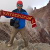 İddiayı kaybetti Erciyes'in zirvesine çıktı İddiayı kaybetti Erciyes'in zirvesine çıktı