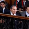 Mursi ve Mübarek ilk kez mahkemede yüzleşti Mursi ve Mübarek ilk kez mahkemede yüzleşti