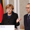 Merkel: Ayrılıkçıları Putin ikna etti Merkel: Ayrılıkçıları Putin ikna etti