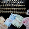 Dilencilerin üzerinden çıkan para şaşırttı Dilencilerin üzerinden çıkan para şaşırttı