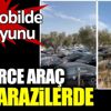 ﻿Yüzlerce araç boş arazilerde bekliyor