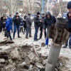 Ukrayna'ya roket yağdı: 8 ölü Ukrayna'ya roket yağdı: 8 ölü