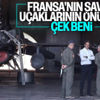 Miçotakis Fransız savaş uçaklarının önünde poz verdi Miçotakis Fransız savaş uçaklarının önünde poz verdi
