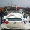 Otomobilin üzerine TIR devrilince... Otomobilin üzerine TIR devrilince...