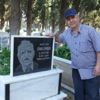 Mezar taşlarına resim yapıyor Mezar taşlarına resim yapıyor