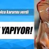 Kramponlarını asıyor