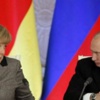 Merkel'den Putin'e Suçlama Merkel'den Putin'e Suçlama