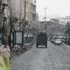 Sur'da teröristler alışveriş yapan kadını vurdu