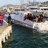 Adada mahsur kalan kaçaklar kurtarıldı Adada mahsur kalan kaçaklar kurtarıldı