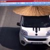 Trafikte şemsiyeli araç şaşırttı (2) Trafikte şemsiyeli araç şaşırttı (2)