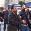 Rıza Sarraf maskesiyle Halkbank'a giden SDP'liler gözaltına alındı Rıza Sarraf maskesiyle Halkbank'a giden SDP'liler gözaltına alındı