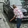Boşanma aşamasındaki kocasının cipine çekiçle saldırdı