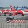 AirAsia uçağı pistten çıktı AirAsia uçağı pistten çıktı