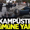 Kampüste yarışan otomobillerden biri takla attı