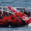 AirAsia uçağının gövde kısmına ilk kez girdiler AirAsia uçağının gövde kısmına ilk kez girdiler