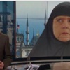 Merkel’e çarşaf giydirdiler Merkel’e çarşaf giydirdiler
