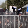 Macar polisinden sığınmacılara biber gazlı müdahale Macar polisinden sığınmacılara biber gazlı müdahale