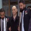 Romanya'da yakalanan 'böcek' zanlıları adliyede Romanya'da yakalanan 'böcek' zanlıları adliyede
