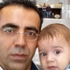 Avukat baba, kucağında bebeğiyle duruşmaya girdi Avukat baba, kucağında bebeğiyle duruşmaya girdi