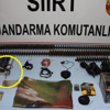 PKK'nın mühimmatının içinden haç çıktı PKK'nın mühimmatının içinden haç çıktı