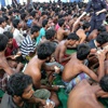 Arakan Müslümanlarını taşıyan tekneler kıyıya vurdu Arakan Müslümanlarını taşıyan tekneler kıyıya vurdu