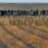 DEAŞ'tan kaçan sivillere terörist muamelesi