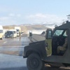 Van'da iş ortağını öldüren polis ailesi ile kaçarken yakalandı Van'da iş ortağını öldüren polis ailesi ile kaçarken yakalandı