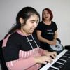 Otizmli Merve, müzikle hayata bağlandı Otizmli Merve, müzikle hayata bağlandı