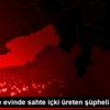 Mersin de evinde sahte içki üreten şüpheli yakalandı Mersin de evinde sahte içki üreten şüpheli yakalandı