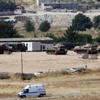 AFP: Türk tankları o köyü vurdu AFP: Türk tankları o köyü vurdu