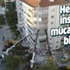 İzmir Bayraklı'da yan yatan bina 3 vinçle desteklenerek arama kurtarma çalışmaları yapılıyor İzmir Bayraklı'da yan yatan bina 3 vinçle desteklenerek arama kurtarma çalışmaları yapılıyor