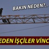 Maaşını alamayan işçiler vince çıktı Maaşını alamayan işçiler vince çıktı