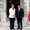 Davutoğlu ve Merkel'den beklenen açıklama Davutoğlu ve Merkel'den beklenen açıklama