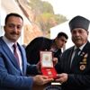 Kıbrıs gazilerine madalya ve beratları verildi Kıbrıs gazilerine madalya ve beratları verildi