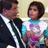 Davutoğlu'ndan engelli miniğe teklif Davutoğlu'ndan engelli miniğe teklif