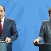Sisi Merkel'in yanında protesto edildi Sisi Merkel'in yanında protesto edildi