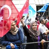Çin hükümeti İngiltere'de protesto edildi