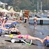 Marmaris'te sıcaklar arttı, sahiller canlandı