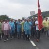 Yağmur altında Adalet Yürüyüşü