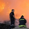 Çöplükteki yangın yağmura rağmen devam etti Çöplükteki yangın yağmura rağmen devam etti