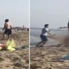Plajda çıplak gezen adama meydan dayağı Plajda çıplak gezen adama meydan dayağı