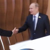 Trump ile Putin ilk kez bir araya geldi Trump ile Putin ilk kez bir araya geldi