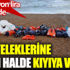 ﻿957 milyon lira değerinde. Can yeleklerine bağlanmış halde kıyıya vurdu