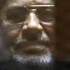 Mursi'nin 'casusluk' davası ertelendi Mursi'nin 'casusluk' davası ertelendi