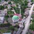 40 yıldır aynı caminin minaresine yuva yapan leylekler köyün simgesi oldu