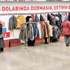 İhtiyacı olan giysiyi askıdan alacak