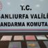 Şanlıurfa'da tezek yığını altında uyuşturucu hap ele geçirildi